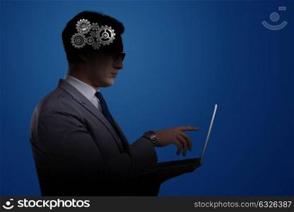 Artificial intelligence concept with man and laptop