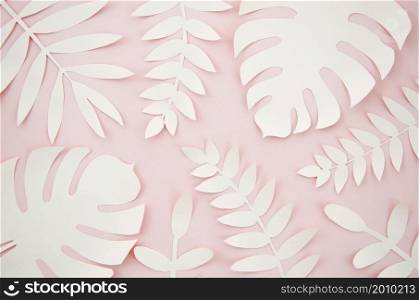artificial leaves paper cut style with pink background