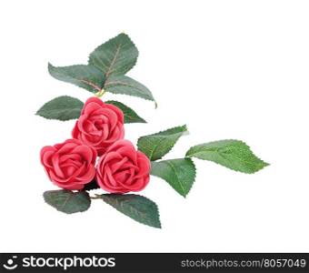 Artificial red roses with leaves made of soap, isolated on white background