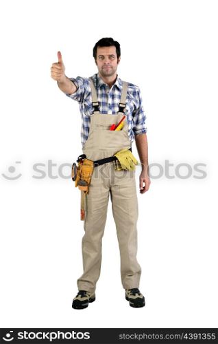 artisan in overalls against white background