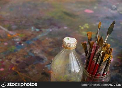 Artist&acute;s Paint Brushes and Bottle by Palette
