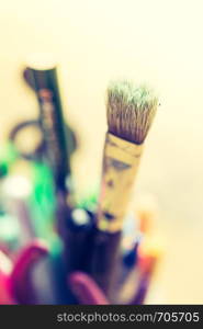 Artist paint brush on creative background. Painting therapy.