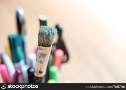 Artist paint brush on creative background. Painting therapy.