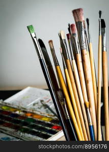 Artist’s set of different brushes for painting with paints.