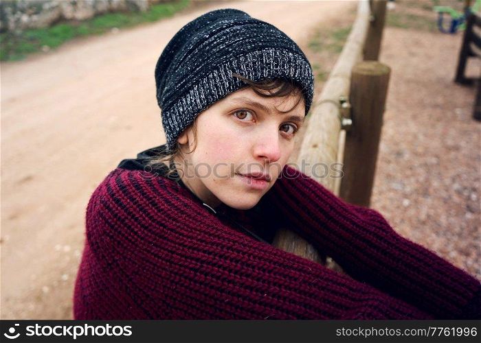 Artistic and reamy portrait of a woman surrouded by nature