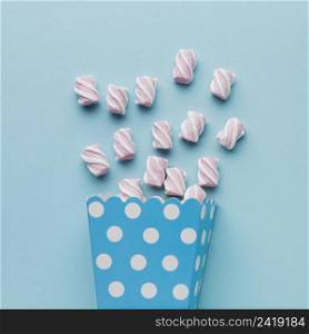 artistic marshmallows blue table