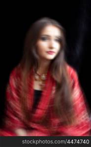 Artistic portrait of a Indian Woman with movement adn blur