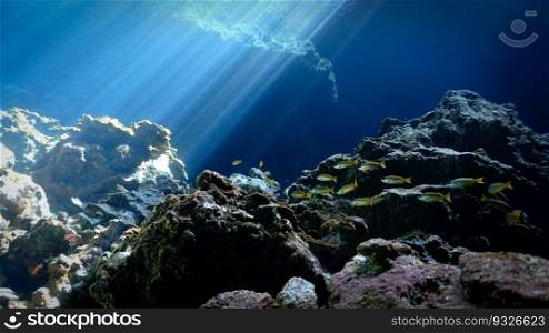 Artistic underwater photography of rays of sunlight inside a cave