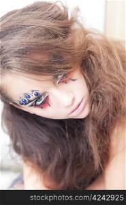 Artistic woman clown - creative art dramatic makeup. Body painting project