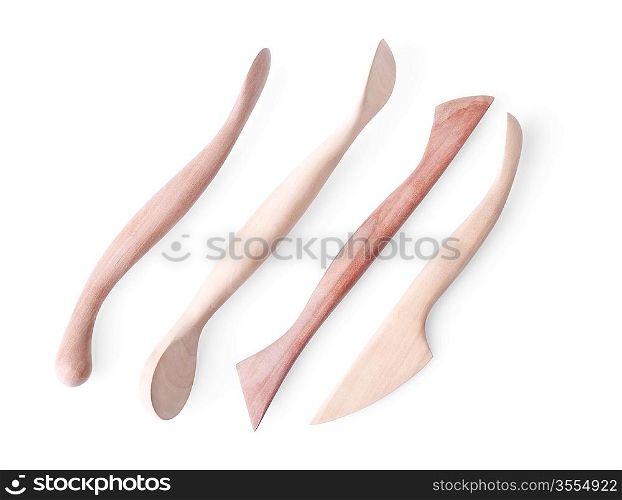 artists sculpting wooden tools isolated on white background