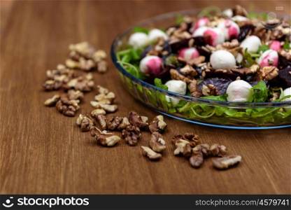 arugula salad with beet quail eggs and nuts