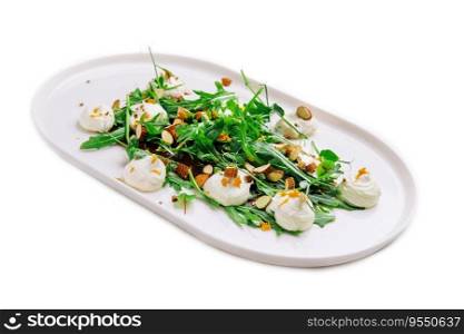 Arugula salad with raw almond slices and burrata cheeses