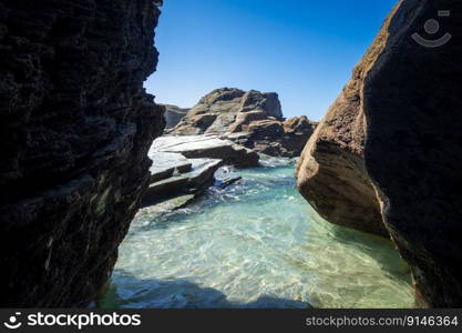 As Catedrais beach - Beach of the Cathedrals - in Galicia, Spain. Cliffs and ocean view. As Catedrais beach - Beach of the Cathedrals - Galicia, Spain