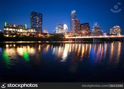 As the sky darkens the city lights brighten and get reflected in the Colorado River