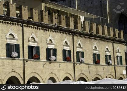 Ascoli Piceno, Marche, Italy: historic buildings by morning. Piazza del Popolo, the main square of the city