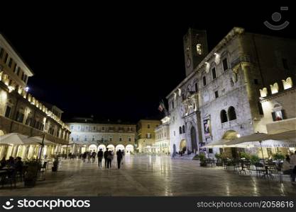 Ascoli Piceno, Marche, Italy: historic buildings by night. Piazza del Popolo, the main square of the city