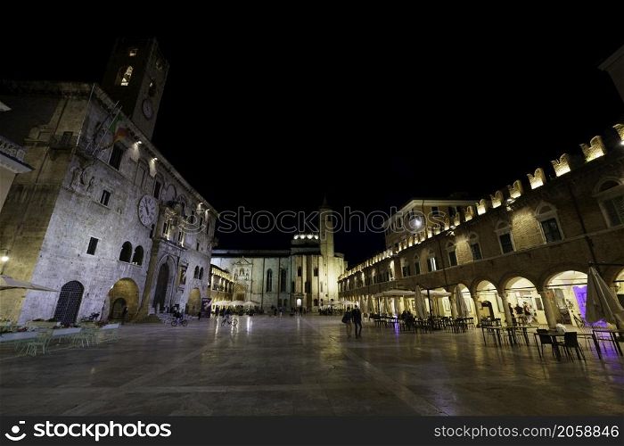 Ascoli Piceno, Marche, Italy: historic buildings by night. Piazza del Popolo, the main square of the city