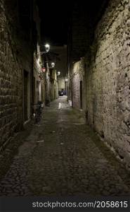 Ascoli Piceno, Marche, Italy: typical alley by night