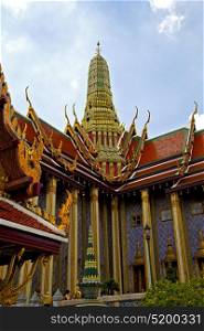 asia bangkok in temple thailand abstract cross colors roof wat sky and colors religion mosaic rain