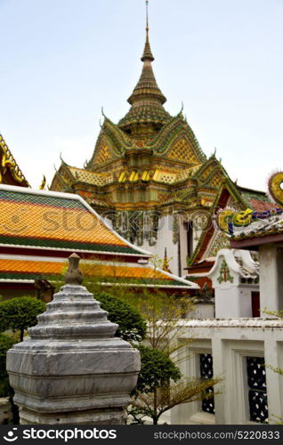 asia bangkok in temple thailand abstract cross colors roof wat sky and colors religion mosaic rain