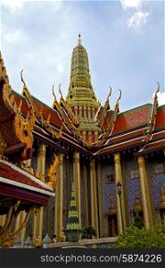 asia bangkok in temple thailand abstract cross colors roof wat sky and colors religion mosaic rain &#xA;