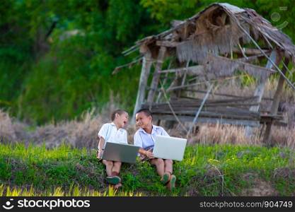 Asia children,Children use laptops for learning in the countryside.