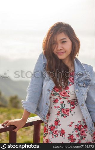 Asian beautiful girl smiling happy on warm sunshine