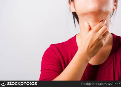 Asian beautiful woman itching her scratching her itchy neck on white background with copy space, Medical and Healthcare concept