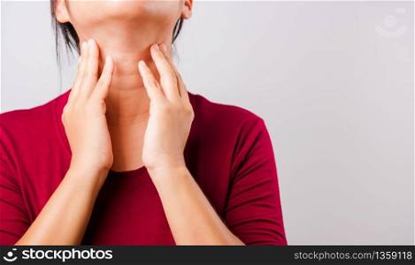 Asian beautiful woman itching her scratching her itchy neck on white background with copy space, Medical and Healthcare concept