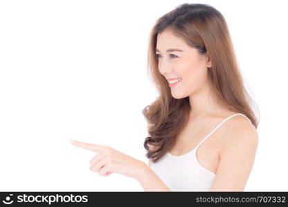 Asian beautiful young woman showing with healthy clean skin presenting something empty copy space on the hand isolated on white background, beauty concept.