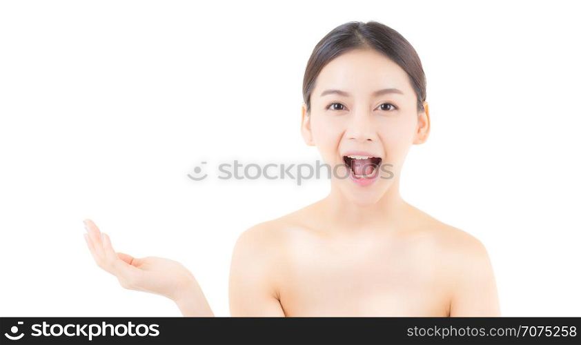Asian beautiful young woman showing with healthy clean skin presenting something empty copy space on the hand isolated on white background and finger pointing with something, beauty concept.