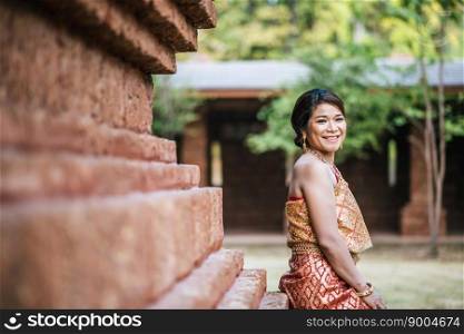 Asian bride posting in old temple