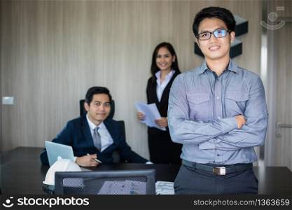 Asian business man and group using notebook for meeting and business men smiling happy for working