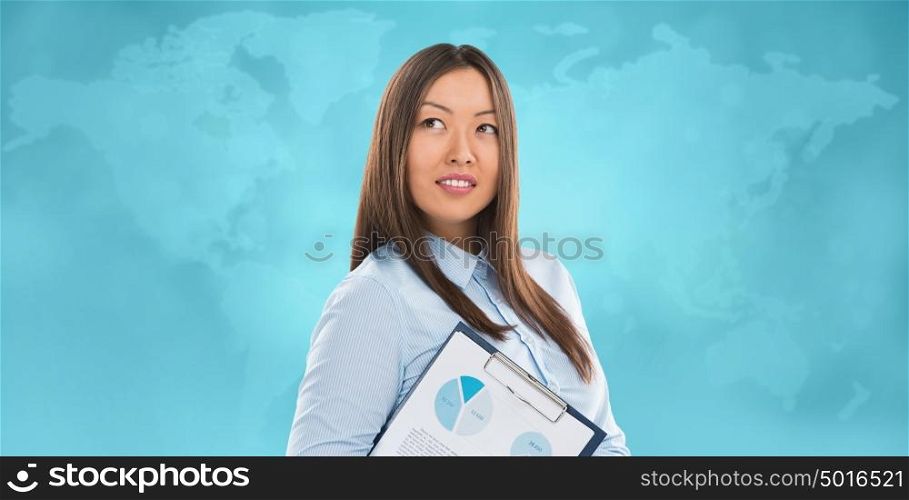 Asian business woman holding reports and smiling against world map background. Copy space