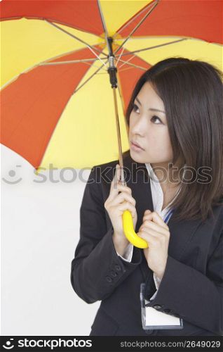 Asian business woman with umberella