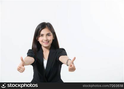 Asian business women are smiling and Thump up hand sign for working happy and Success and winning concept on white background
