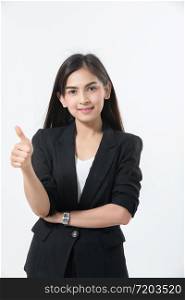 Asian business women are smiling and Thump up hand sign for working happy and Success and winning concept on white background