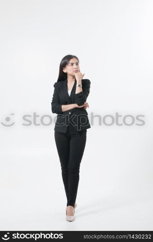 Asian business women are thinking to create new jobs and are smiling and working happy on white background