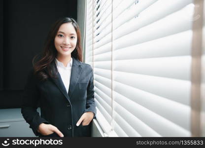 Asian business women smiling happy for working