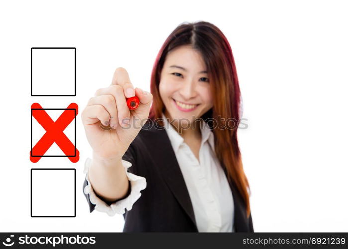 Asian businesswoman filling X in checkbox on virtual screen