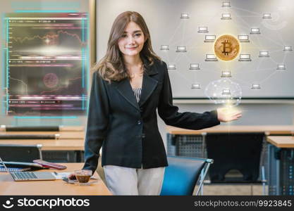 Asian businesswoman in casual suit present polygonal brain shape of an artificial intelligence with Distributed computer network hologram of block chain and trading graph,AI and business IOT concept