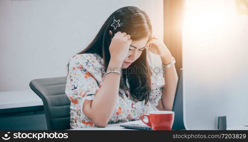 Asian businesswoman serious about the work and using notebook for business partners discussing documents and ideas at meeting