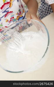 Asian child and glass bowl