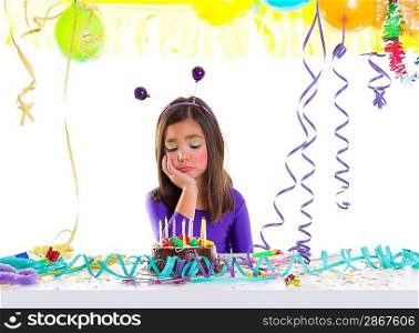asian child kid girl in birthday party bored sad gesture and chocolate cake
