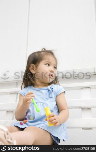 Asian child wearing blue