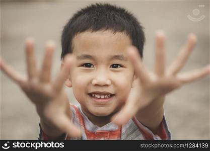 asian children playing with happiness face
