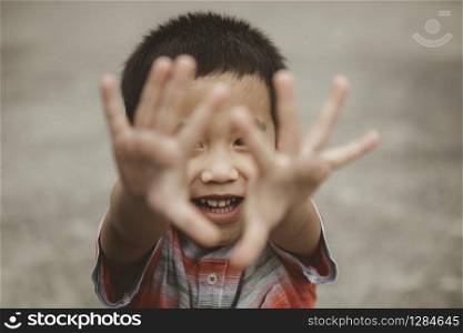 asian children playing with happiness face