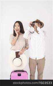Asian couple tourists are enjoying on white background
