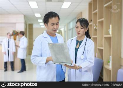 Asian Doctors are working in hospital , medical health care concept