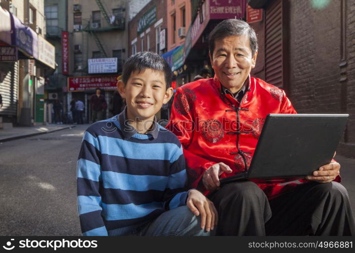 Asian family in front of store